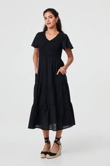 Smocked Flared Sleeve Tiered Midi Dress